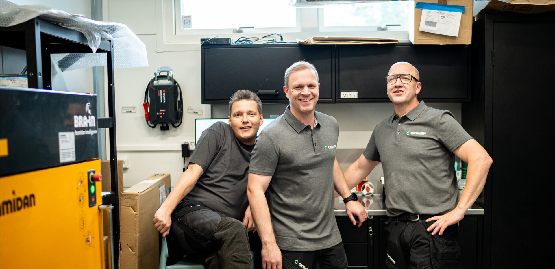 Medarbejdere hos Carbucks skaber god stemning og samarbejde på værkstedet